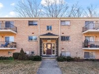 Building Photo - Commuter’s Dream! Large 2BR/2BA Condo Steps from Metro – All Utilities Included!