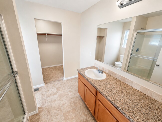 Building Photo - Easy-Living 3 Bed, 2 Bath Home with Double Garage, Pool Access & Private Courtyard