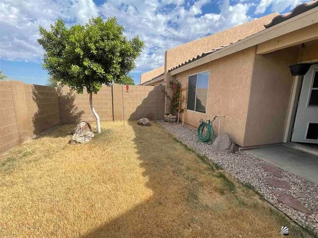 Building Photo - 9027 E 31st Ln