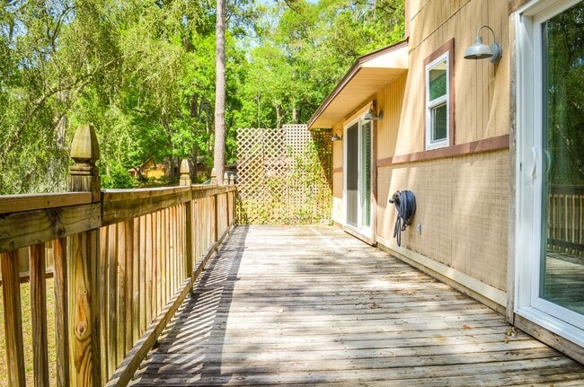 Building Photo - Check out this huge private fenced back yard at this Timberlane home!