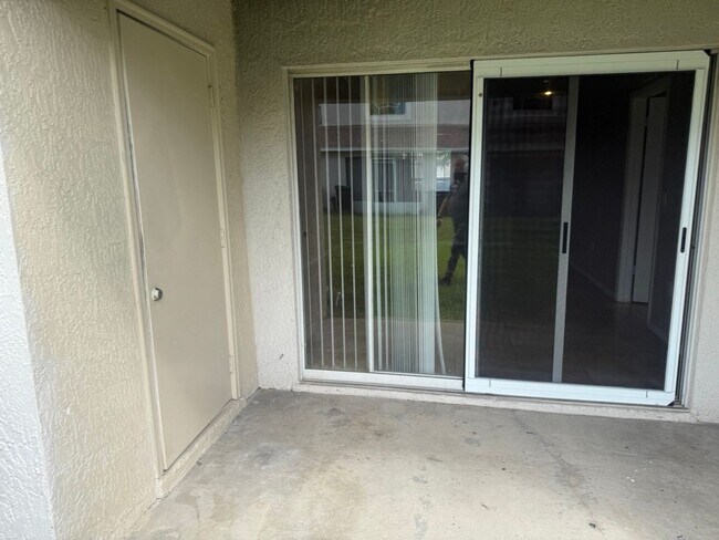 Building Photo - 3/2 Villa Located in Desirable S. Orlando ...