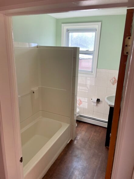 Shared bathroom with two other roommates. - 156 Kearny Ave
