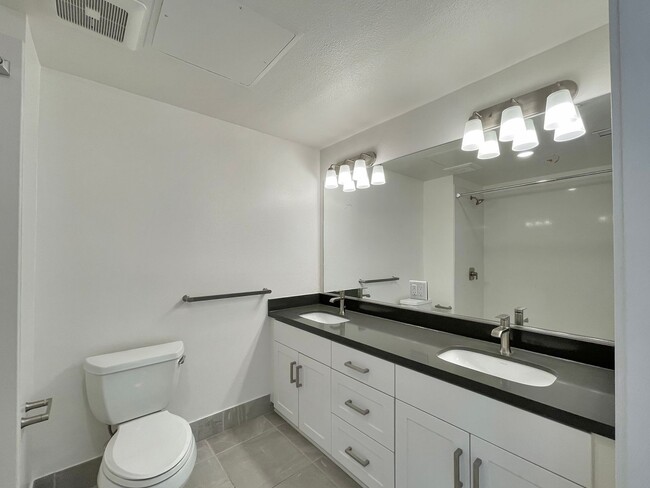 Building Photo - Modern 2BD Fremont Condo – EV Charger, Balcony, & Walk to BART