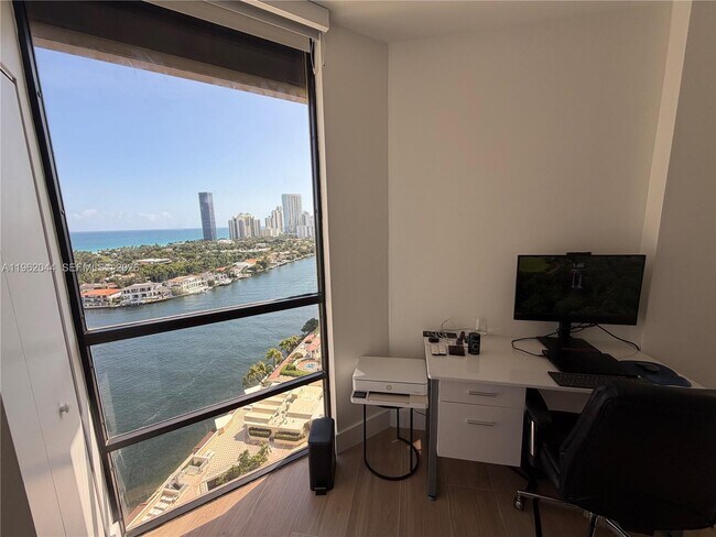 Building Photo - 20191 E Country Club Dr