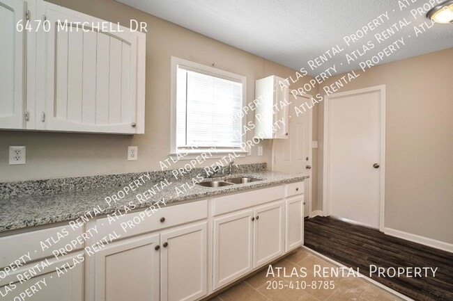 Building Photo - 6470 Mitchell Dr