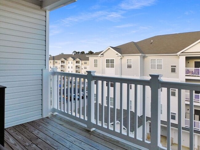 Building Photo - Pet Friendly Condo with Deck and 1 Car Garage