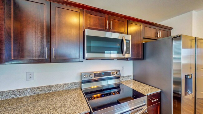 Building Photo - "Spacious 3-Bed Townhouse with Granite Tou...