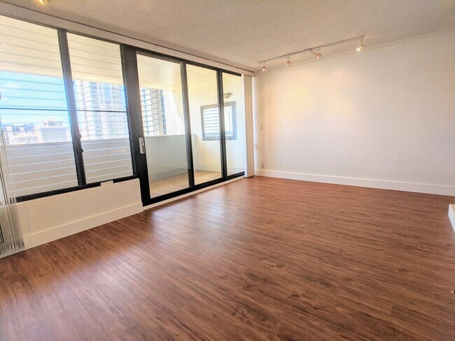 Building Photo - Sweeping Views from this partially furnished 1 Bed 1 Bath Condo w/ 1 Covered Parking