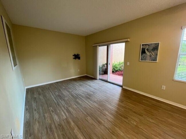 Building Photo - Gardens at Beachwalk - Unit 111