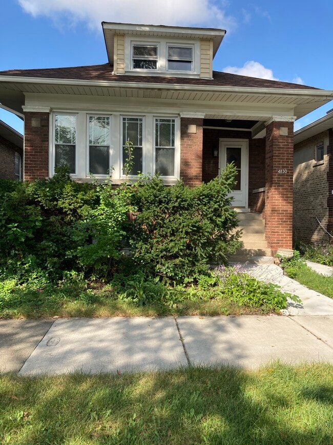 Building Photo - 4830 N Tripp Ave