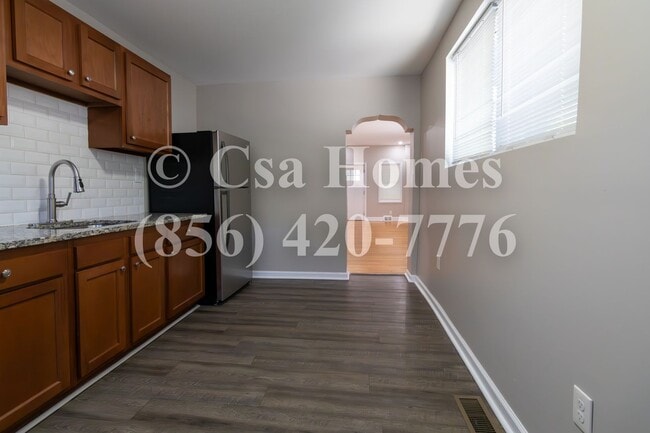 Building Photo - Beautiful 2 Bedroom End Row Home in Liberty Park with Driveway and Shed!