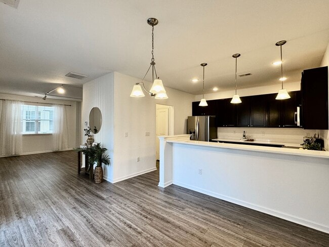 Building Photo - Available NOW! 1st Time Rental! Water, Sewer Trash, Landscaping, Community Pool Included!