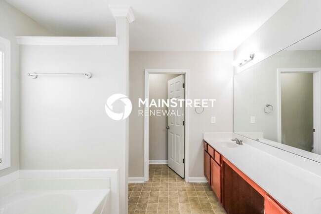 Building Photo - 6 Bedroom Pet-Friendly Home in Buford, GA with Main Street Renewal