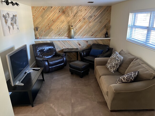 Downstairs living room with internet TV - 14532 E Radcliff Dr