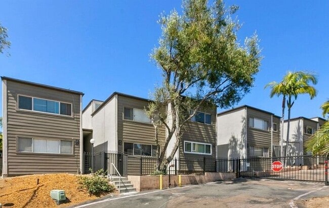 Building Photo - Updated Gated Condo with Pool Access Near SDSU & Shopping