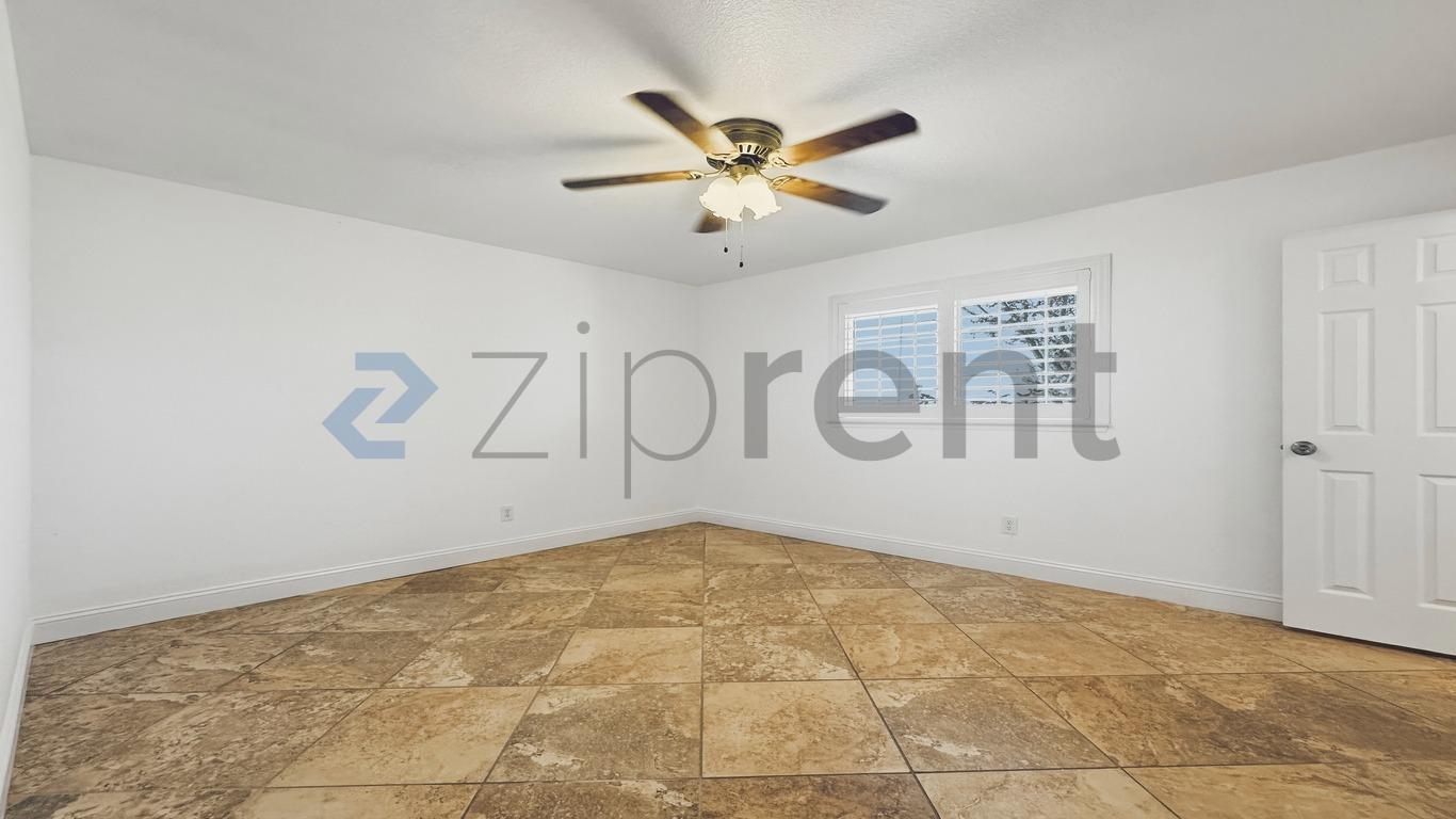 Building Photo - 8730 S East Ave