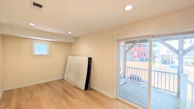 Building Photo - Spacious Townhouse: 4-bed, 3.5 bath unit in Brighton with Garage Parking