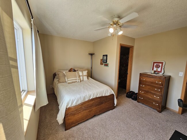 Second bedroom with closet and attached full bath. - 212 Alydar Dr