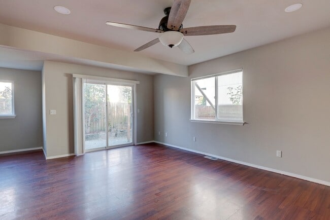 Building Photo - Spacious 4-Bedroom Home with Cozy Backyard...