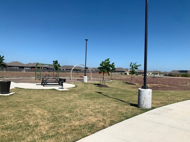 Building Photo - Luxury Vinyl Plank (No Carpet) /  Fridge Included / Office / Covered Back Patio / CISD