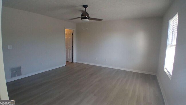 Building Photo - 5677 Wind Gate Ln