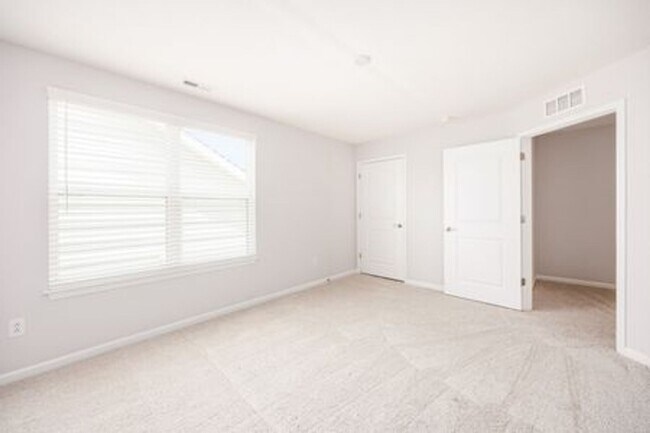 Building Photo - Updated 3-Bedroom Home with 3 Baths, Open-Concept Layout, Luxury Flooring & Bright Modern Kitchen