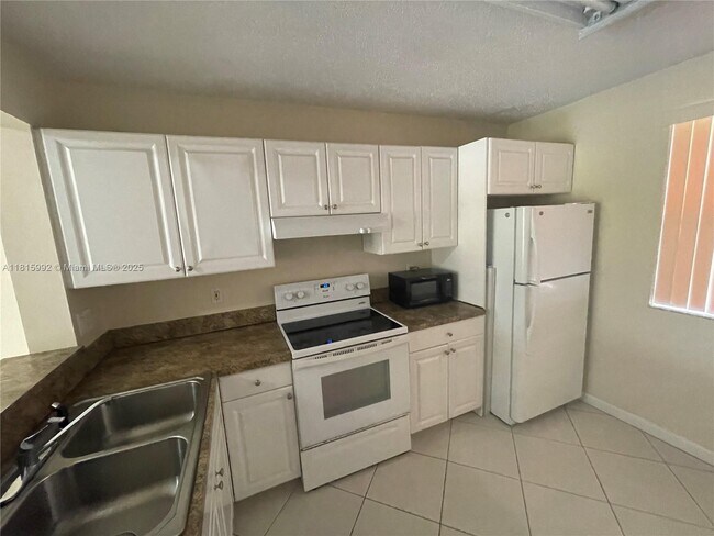 Building Photo - 5661 Riverside Dr