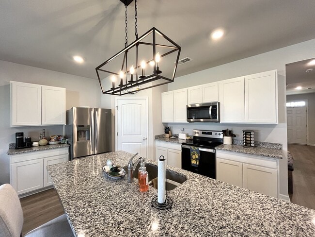 Building Photo - 4-Bedroom w/ Open Layout & Community Perks