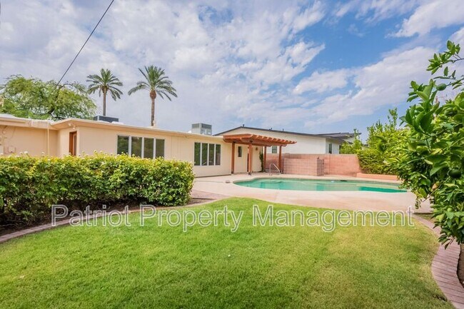 Building Photo - 7024 E Orange Blossom Ln