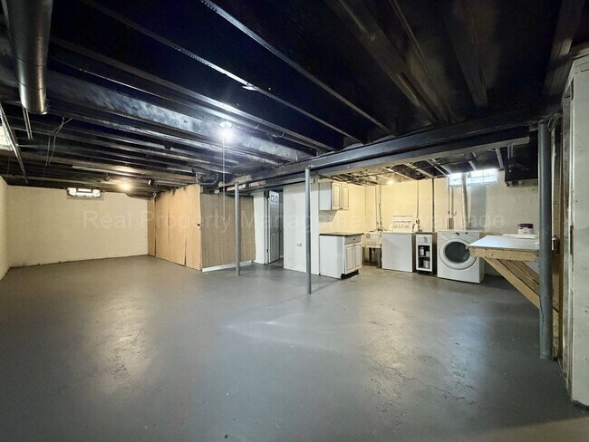 Building Photo - Solid Brick and Renovated with New Kitchen and Two Full Baths!