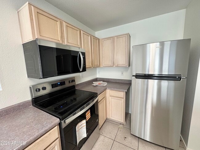 Building Photo - 8548 E Laguna Azul Ave