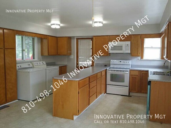 Building Photo - Spacious 4 bedroom , 1 1/2 bath home in Ga...