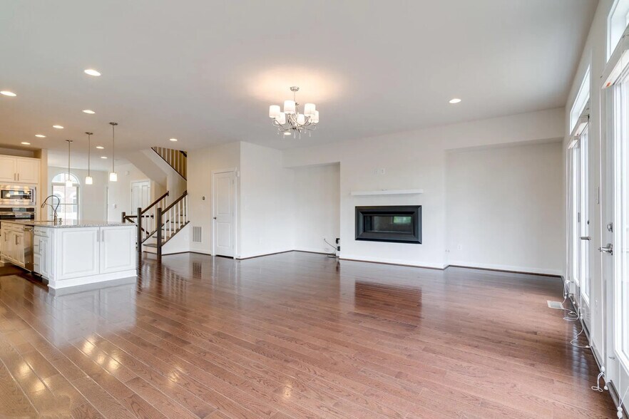 living space with fireplace - 7200 Holywell Lane