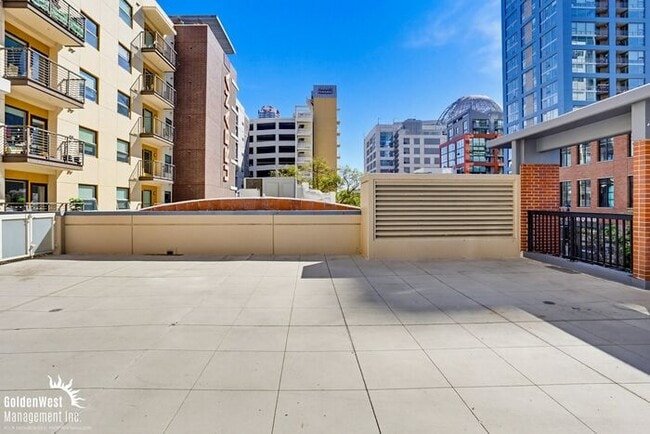 Building Photo - Immaculate 1Bdm 1Ba Condo with Massive Private Patio in the Diamond Terrace Building in Prime Dow...