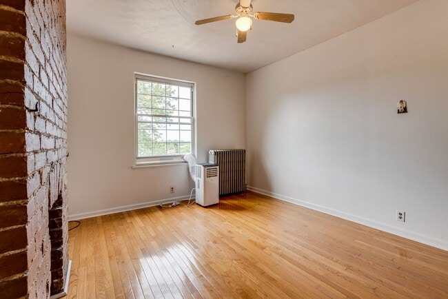 Building Photo - AVAILABLE June 2026 - Beautiful 4 Bedroom, 2 Bath Home w/ Front Porch Swing!