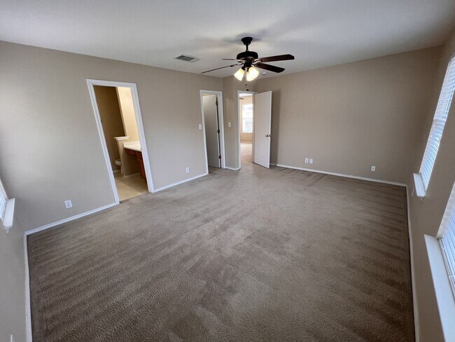 Building Photo - Generous Outdoor Space & Lawn Care Included!