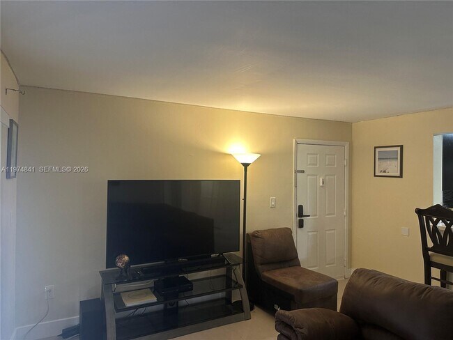 Building Photo - 9491 Palm Cir S