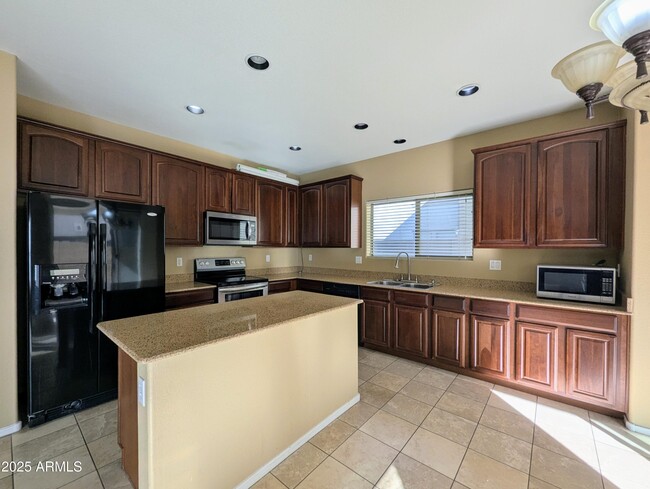 Building Photo - 6455 W Orchid Ln