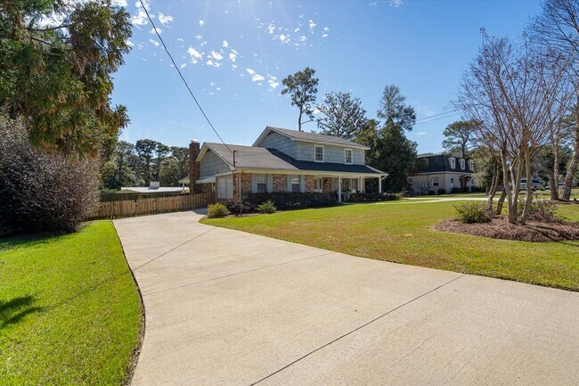 Building Photo - Spacious 4-Bedroom Home with Pool, Two Pri...
