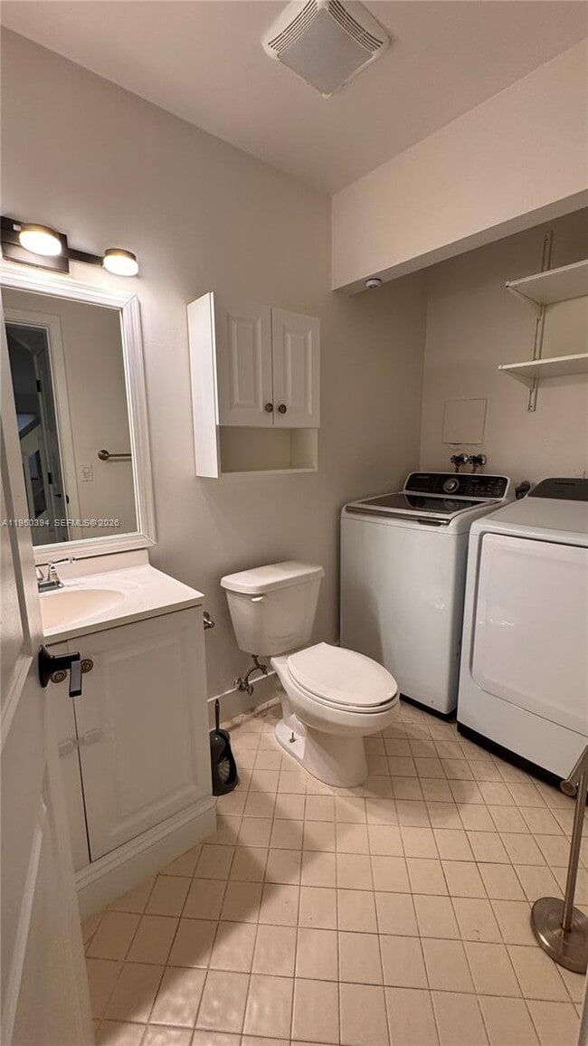 Building Photo - 3801 Cocoplum Cir