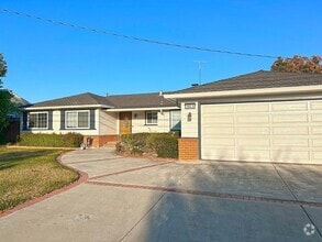 Building Photo - Coming Soon – Spacious 5-Bed Single Level ...