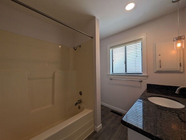 Building Photo - Updated 3-Bedroom, 2.5-Bath Home ~ Solid Surface Flooring and Spacious Kitchen!