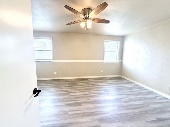 Building Photo - Stylish Two-Story Duplex with Loft, Fireplace & Private Backyard in New Braunfels!