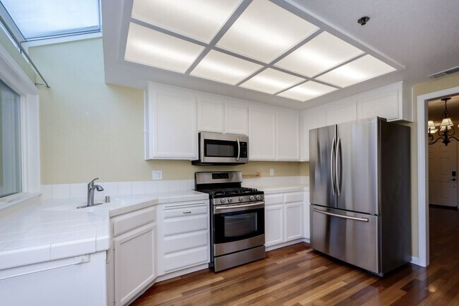 Building Photo - 3BR/3BA Pet-Friendly Village In The Park Townhome with Pool & 2-Car Garage | YouTube Tour