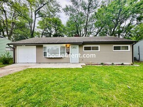 Building Photo - Lovely Three Bedroom Home in KCMO and an Updated Kitchen  w/ Granite and SS Appliances, including...