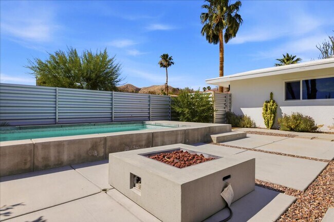 Building Photo - 3 bed / 2 Bath Mid-Century Home with Two-Car Garage, Soaking Pool and Manicured Backyard!