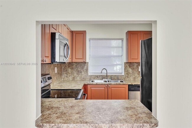 Building Photo - 9410 Tangerine Pl
