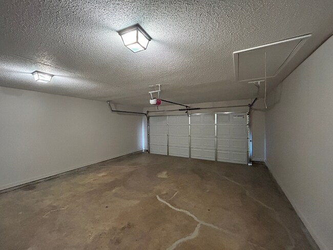 Building Photo - Spacious 3BR/2BA Lake Community Home | Soaring High Ceilings, Fireplace & 2-Car Garage