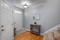 Building Photo - Townhouse in Lake Hogan Farms - 4 bedrooms - Amenities include community pool, tennis and playground