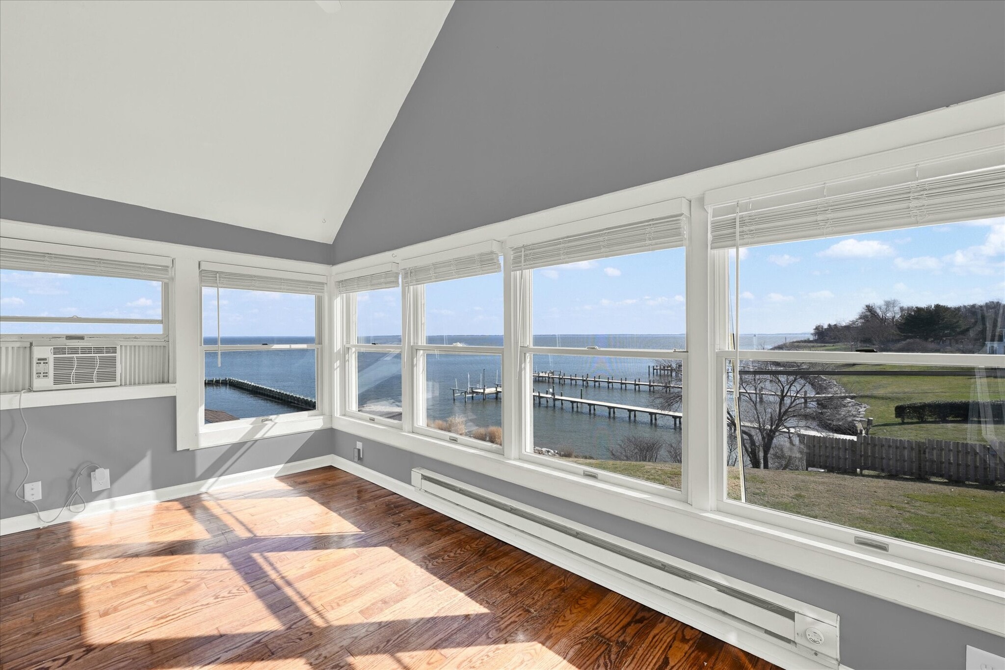 master bedroom with East South and West window views - 1301 Rogers Rd